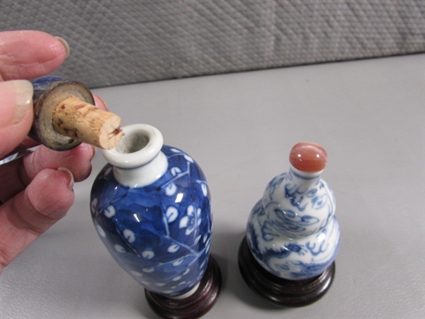 COLLECTION OF SMALL ORIENTAL BOTTLES WITH STONE STOPPERS