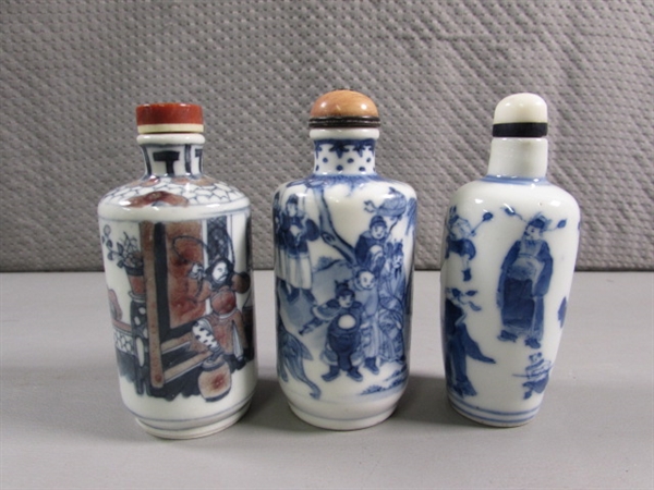 COLLECTION OF SMALL ORIENTAL BOTTLES WITH STONE STOPPERS