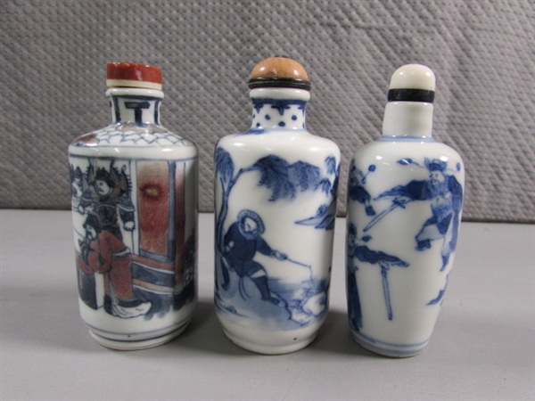 COLLECTION OF SMALL ORIENTAL BOTTLES WITH STONE STOPPERS