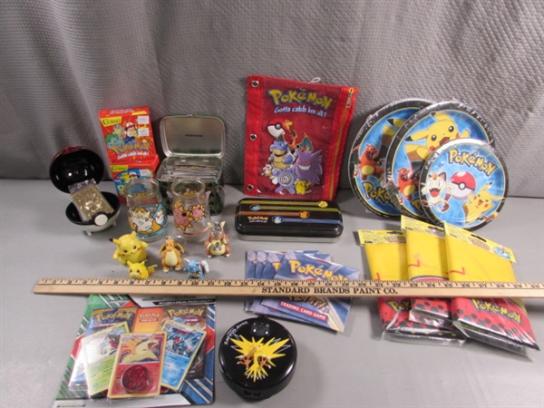 COLLECTION OF POKEMON ITEMS INCLUDING 23 KT GOLD PLATED POLIWHIRL TRADING CARD