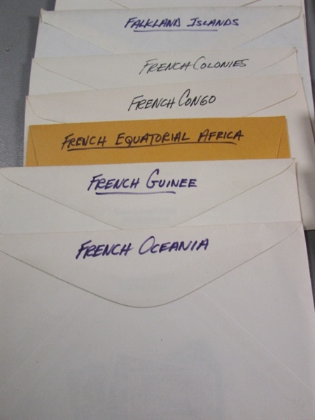 FOREIGN POSTAGE STAMPS - ENVELOPES LABELED W/COUNTRIES D-M