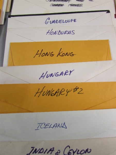 FOREIGN POSTAGE STAMPS - ENVELOPES LABELED W/COUNTRIES D-M