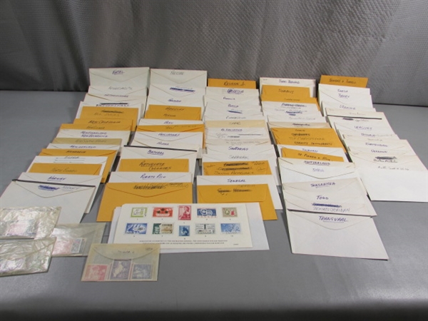 FOREIGN POSTAGE STAMPS - ENVELOPES LABELED W/COUNTRIES N-Z