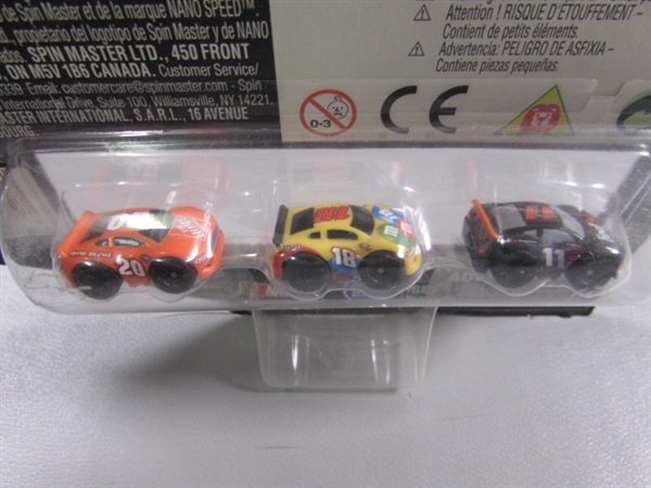 COLLECTION OF M&M DIECAST CARS & MORE - MOST ARE NEW IN PACKAGE