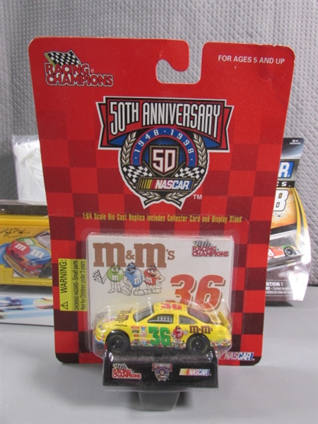 COLLECTION OF M&M DIECAST CARS & MORE - MOST ARE NEW IN PACKAGE