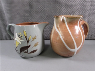 PAIR OF POTTERY PITCHERS