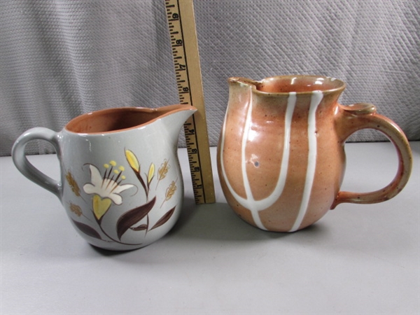 PAIR OF POTTERY PITCHERS