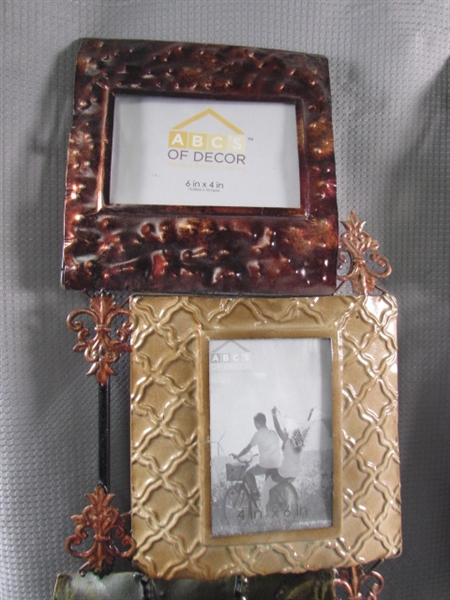 PAIR OF METAL WALL MOUNT PICTURE FRAMES