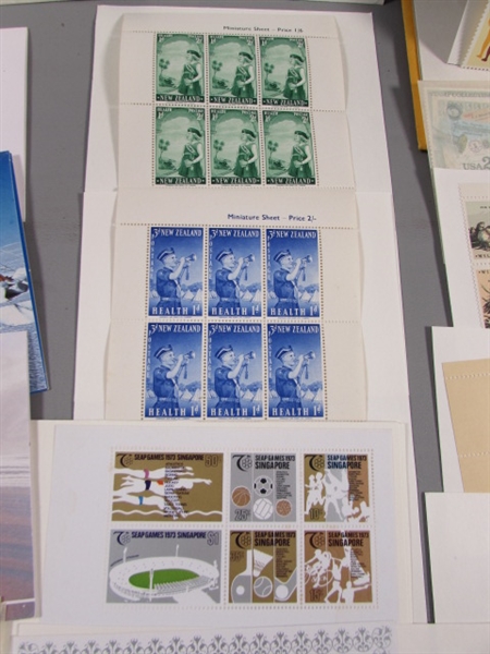 POSTAGE STAMP COLLECTION #1 - NEW UNHINGED & SOME POSTCARDS