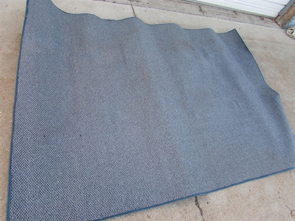 INDOOR/OUTDOOR AREA RUG - NEEDS CLEANING