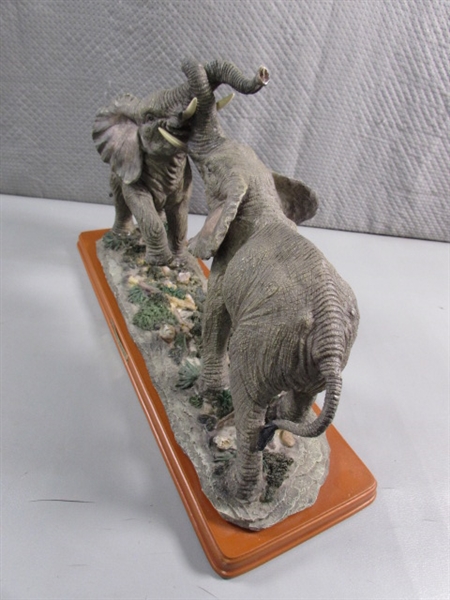 ELEPHANTS ON WOOD BASE STATUE - RESIN