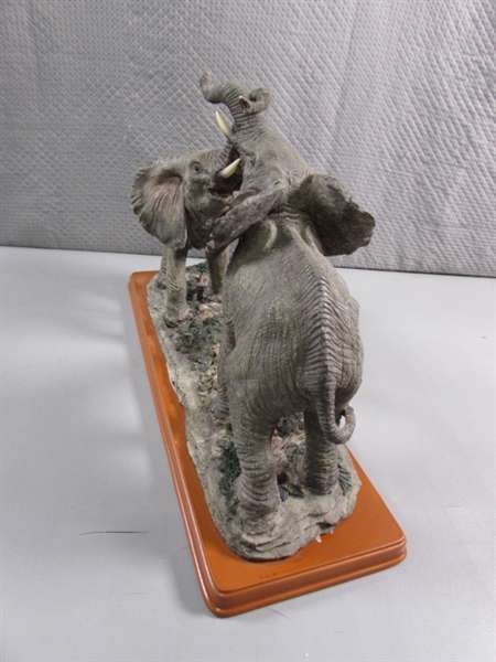 ELEPHANTS ON WOOD BASE STATUE - RESIN