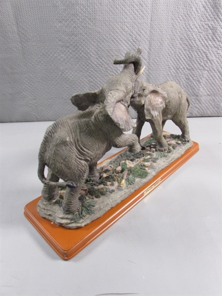 ELEPHANTS ON WOOD BASE STATUE - RESIN