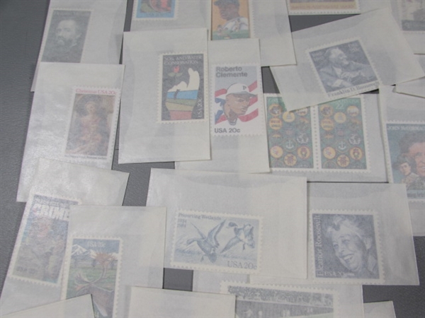 MIXED LOT OF POSTAGE STAMP SINGLES IN GLASSINE ENVELOPES #1