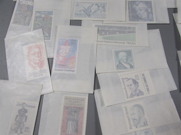 MIXED LOT OF POSTAGE STAMP SINGLES IN GLASSINE ENVELOPES #1