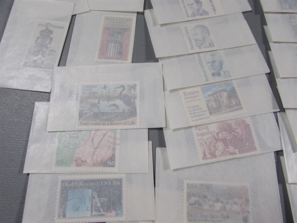 MIXED LOT OF POSTAGE STAMP SINGLES IN GLASSINE ENVELOPES #1