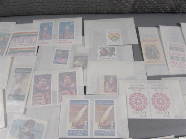 MIXED LOT OF POSTAGE STAMP SINGLES IN GLASSINE ENVELOPES #1