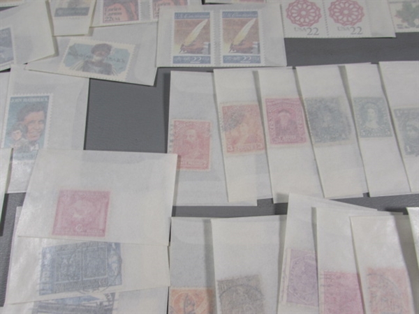 MIXED LOT OF POSTAGE STAMP SINGLES IN GLASSINE ENVELOPES #1