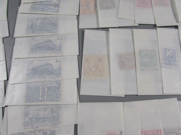 MIXED LOT OF POSTAGE STAMP SINGLES IN GLASSINE ENVELOPES #1