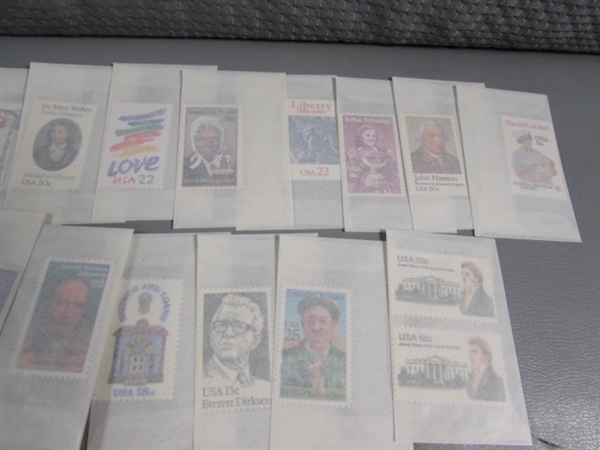 MIXED LOT OF POSTAGE STAMP SINGLES IN GLASSINE ENVELOPES #1