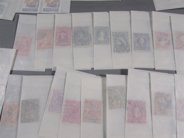 MIXED LOT OF POSTAGE STAMP SINGLES IN GLASSINE ENVELOPES #1