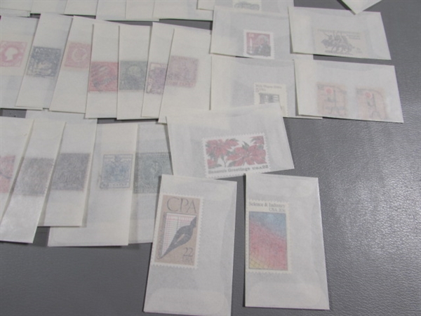 MIXED LOT OF POSTAGE STAMP SINGLES IN GLASSINE ENVELOPES #1