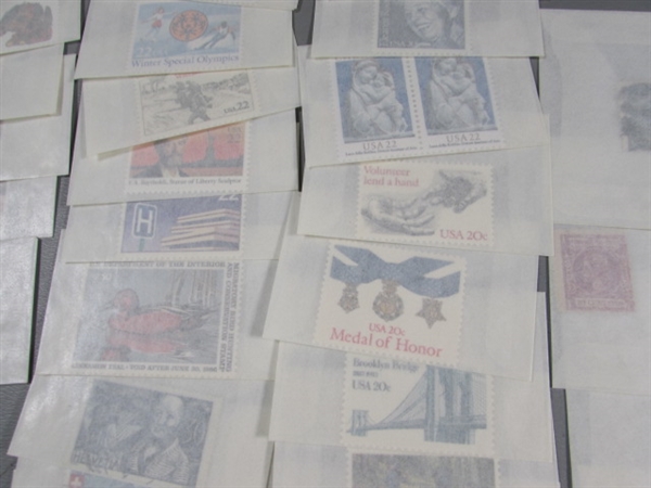 MIXED LOT OF POSTAGE STAMP SINGLES IN GLASSINE ENVELOPES #2