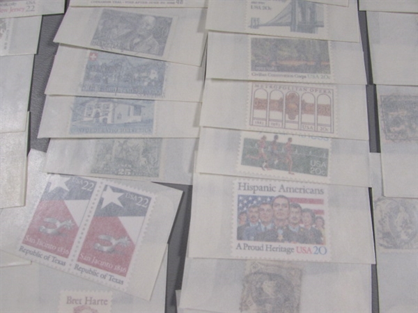 MIXED LOT OF POSTAGE STAMP SINGLES IN GLASSINE ENVELOPES #2