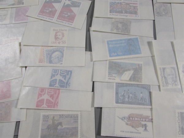 MIXED LOT OF POSTAGE STAMP SINGLES IN GLASSINE ENVELOPES #2