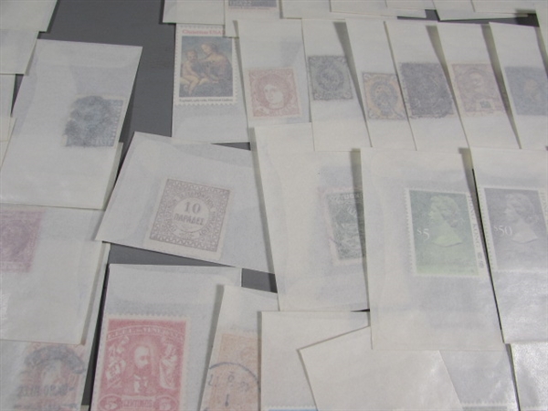 MIXED LOT OF POSTAGE STAMP SINGLES IN GLASSINE ENVELOPES #2