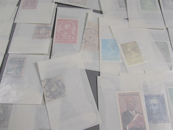 MIXED LOT OF POSTAGE STAMP SINGLES IN GLASSINE ENVELOPES #2