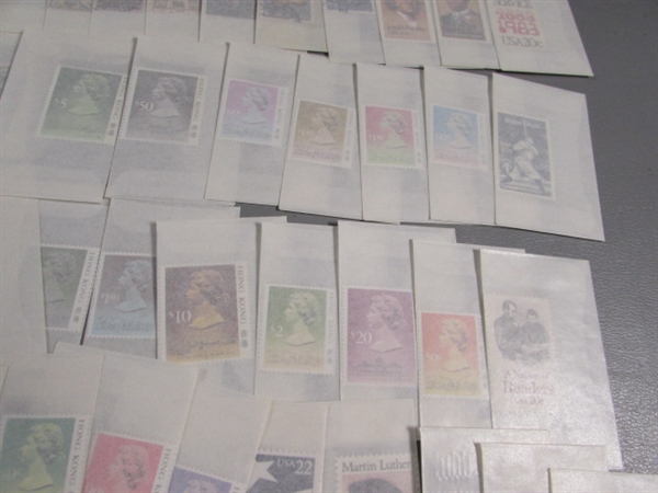 MIXED LOT OF POSTAGE STAMP SINGLES IN GLASSINE ENVELOPES #2