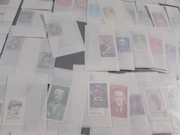 MIXED LOT OF POSTAGE STAMP SINGLES IN GLASSINE ENVELOPES #2