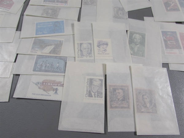 MIXED LOT OF POSTAGE STAMP SINGLES IN GLASSINE ENVELOPES #2