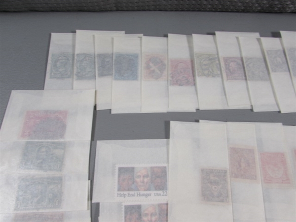 MIXED LOT OF POSTAGE STAMP SINGLES IN GLASSINE ENVELOPES #3