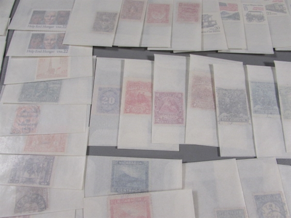 MIXED LOT OF POSTAGE STAMP SINGLES IN GLASSINE ENVELOPES #3