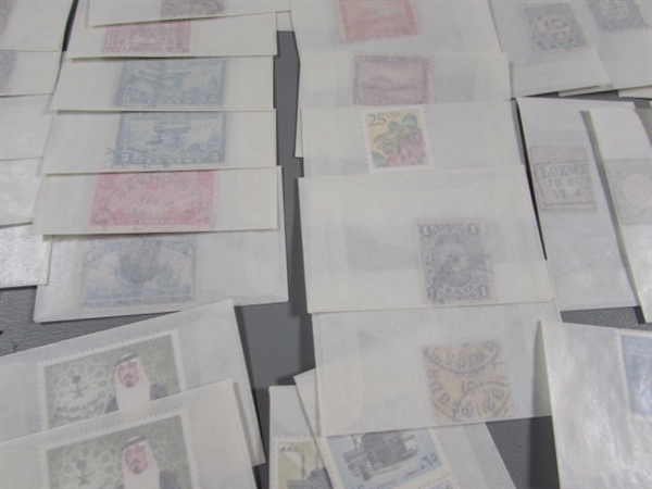 MIXED LOT OF POSTAGE STAMP SINGLES IN GLASSINE ENVELOPES #3