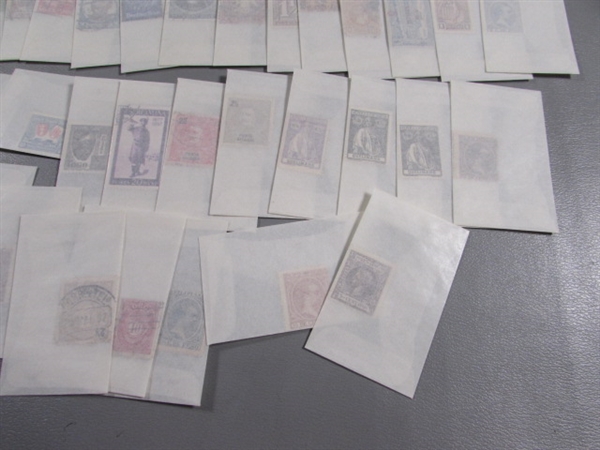 MIXED LOT OF POSTAGE STAMP SINGLES IN GLASSINE ENVELOPES #3