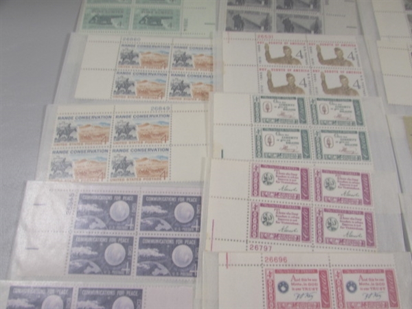 MOSTLY 4 CENT US POSTAGE STAMP BLOCKS IN GLASSINE ENVELOPES-UNUSED