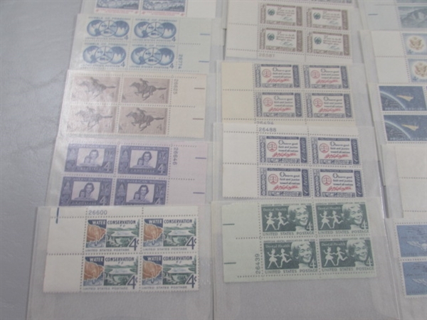 MOSTLY 4 CENT US POSTAGE STAMP BLOCKS IN GLASSINE ENVELOPES-UNUSED