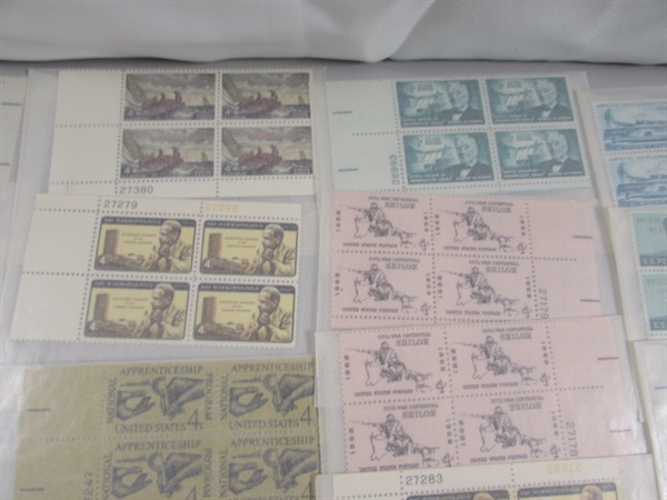 MOSTLY 4 CENT US POSTAGE STAMP BLOCKS IN GLASSINE ENVELOPES-UNUSED