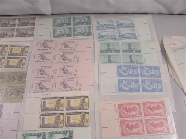 MOSTLY 4 CENT US POSTAGE STAMP BLOCKS IN GLASSINE ENVELOPES-UNUSED