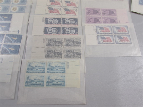 MOSTLY 4 CENT US POSTAGE STAMP BLOCKS IN GLASSINE ENVELOPES-UNUSED