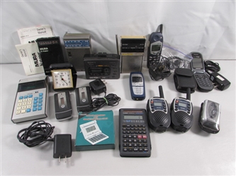 ASSORTED SMALL ELECTRONICS CELL PHONES, RADIOS, CALCULATORS, CLOCKS & MORE