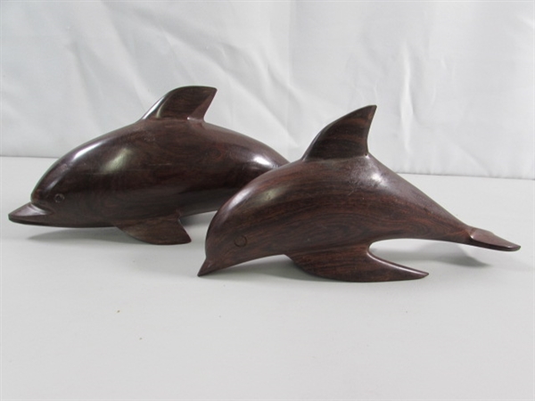 PAIR OF CARVED IRONWOOD DOLPHIN STATUES