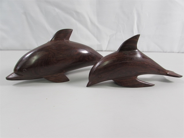 PAIR OF CARVED IRONWOOD DOLPHIN STATUES