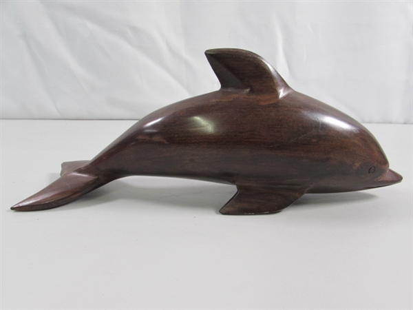 PAIR OF CARVED IRONWOOD DOLPHIN STATUES