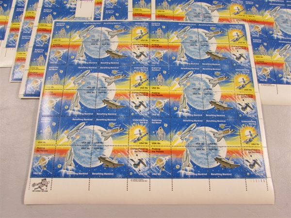 11 SHEETS OF 18 CENT GUMMED POSTAGE STAMPS - SPACE EXPLORATION