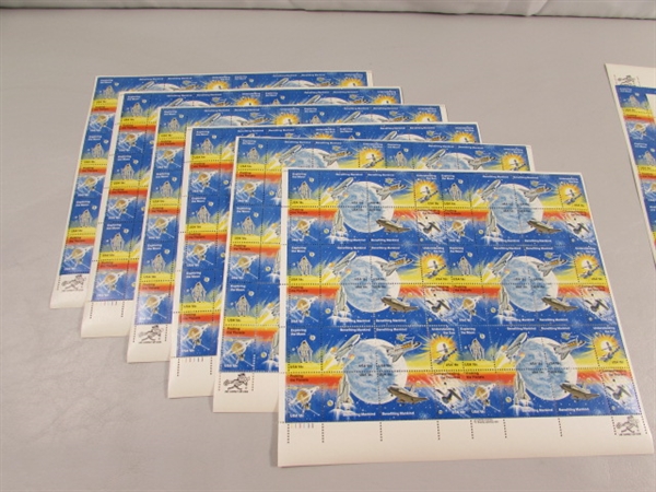 11 SHEETS OF 18 CENT GUMMED POSTAGE STAMPS - SPACE EXPLORATION