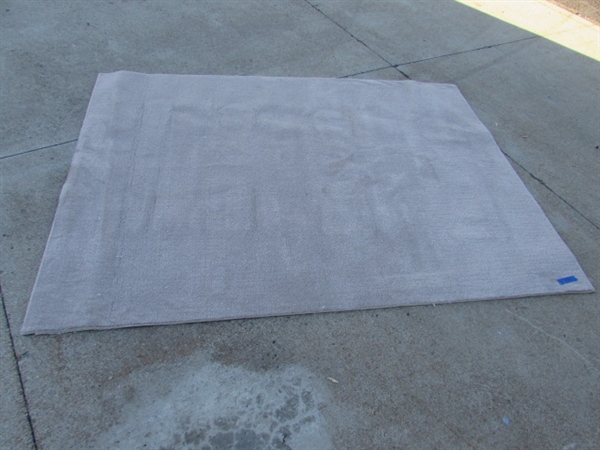 5' X 7' BEIGE AREA RUG W/NON-SLIP PADDING